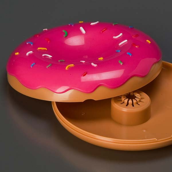 The Simpsons Movie Donut Shaped DVD Case Injection moulded in the form of Homer's favourite snack, donuts.