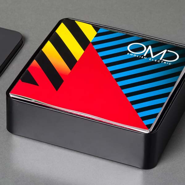 OMD - English Electric in embossed tin.